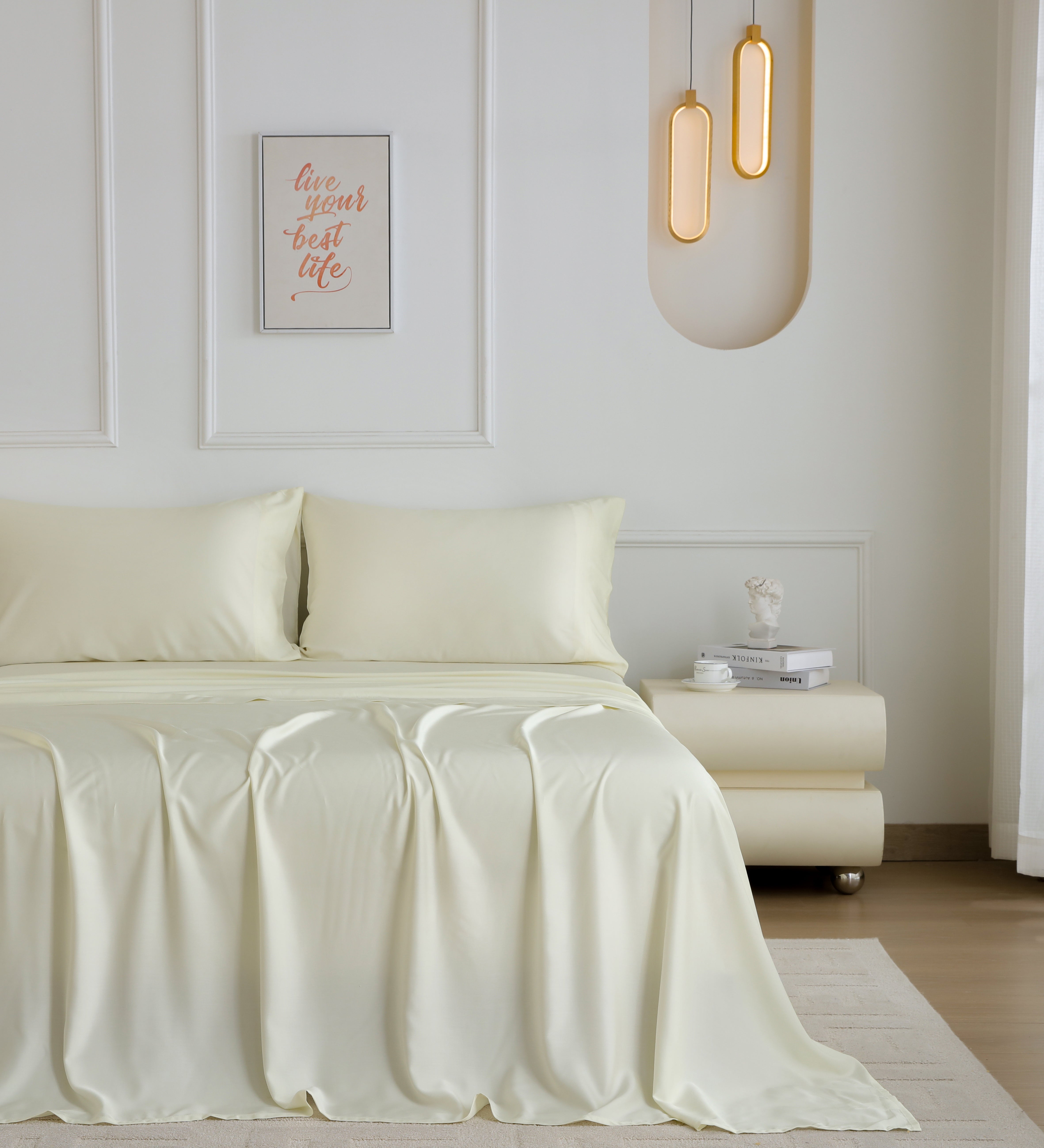 Neatly made bed with white bedding in a modern bedroom.
